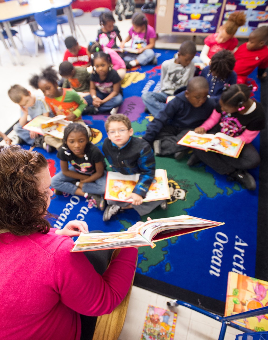 Children reading together in classroom
